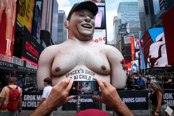 Protest Grok as Elon Musk’s Massive Sculpture Is Raised Over Times Square